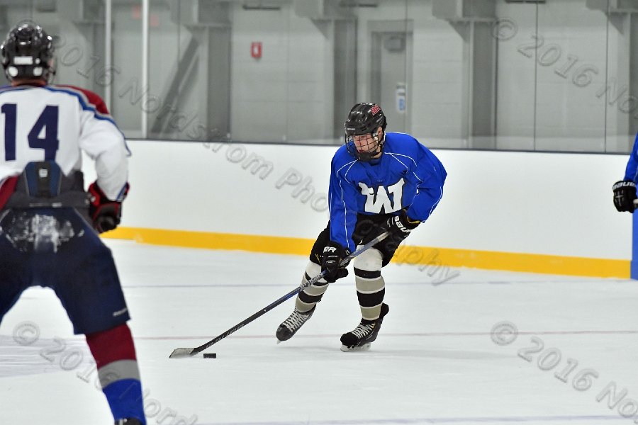 Wheaton College Men\'s Ice Hockey vs Middlesex Community College. - Photo By: KEITH NORDSTROM